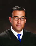 Portrait of Speaker Name
